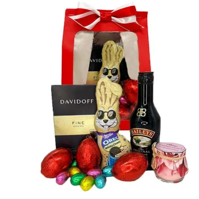Imagine din Pachet HappyEaster, Cafea Davidoff Fine Aroma, whisky Baileys’, lumanare parfumata cu mireasma de rose, iepuras milka oreo si 11 ousoare ciocolata